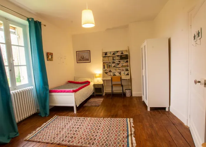 L' Ostal Casa de Férias *